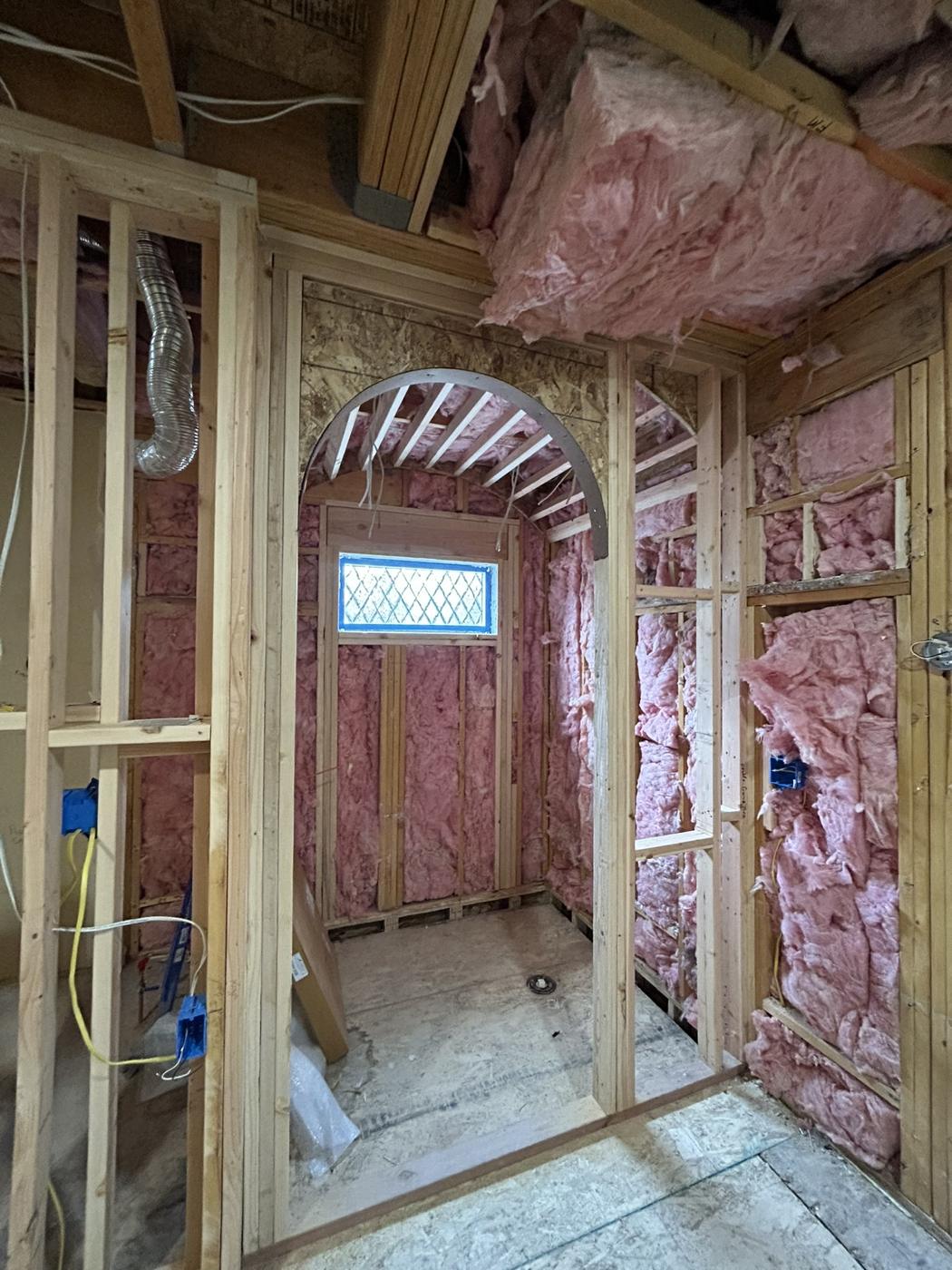 Bathroom framed to the studs during the rebuild