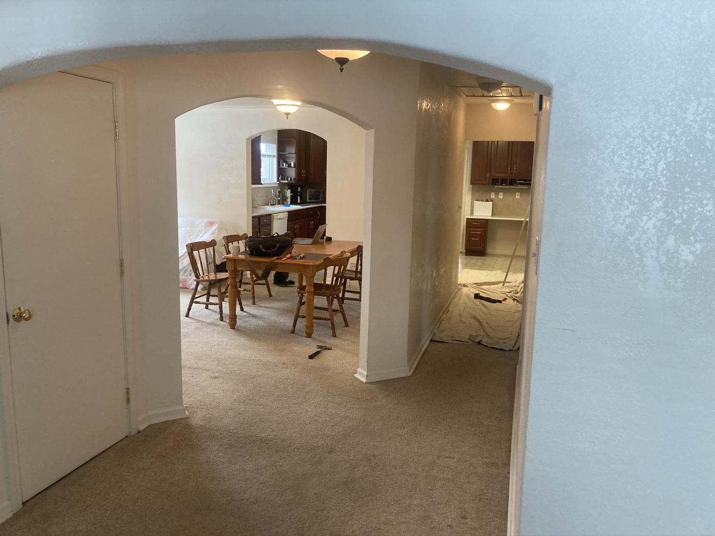 Arched doorway in the wall before removal