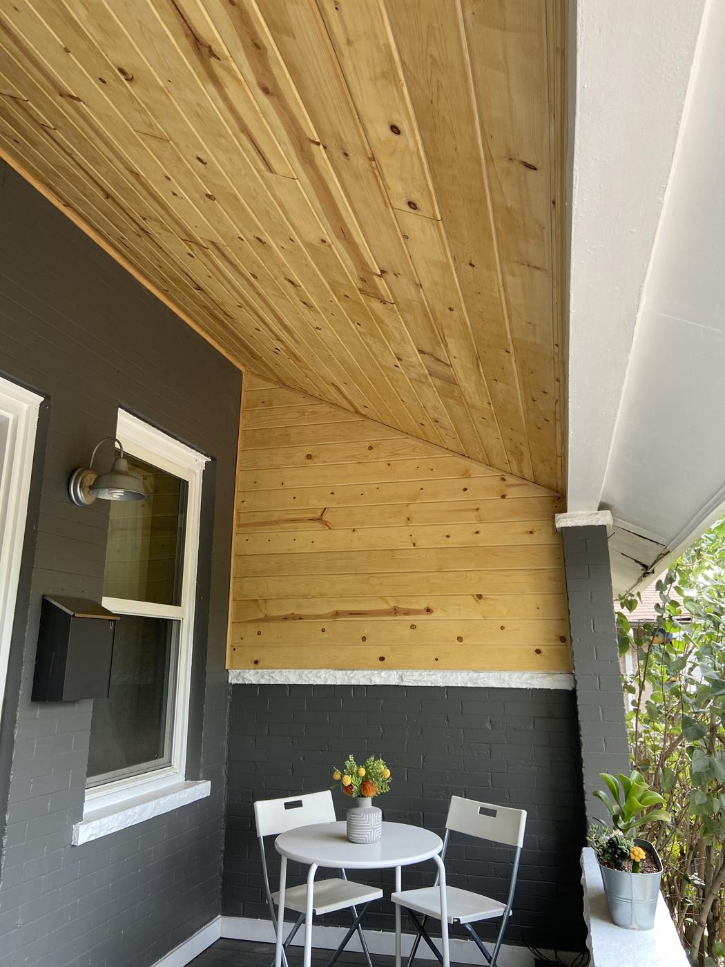 Front porch with cedar ceiling and fresh trim