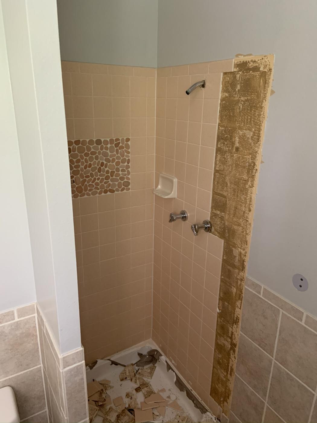 Dated tile shower before